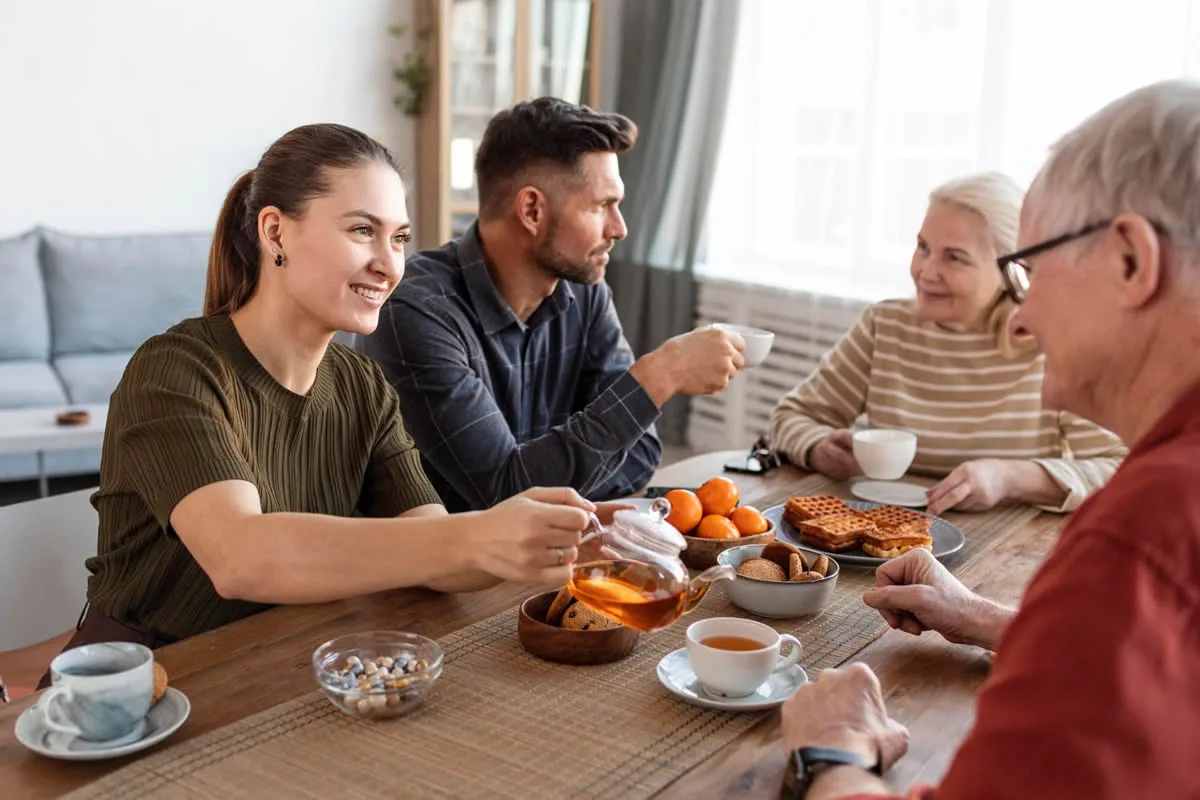 Family Discussing Future Planning Adult family members discussing future planning together at home