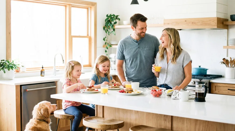 Family enjoying breakfast together Family enjoying breakfast together