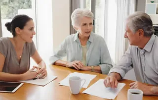 Family discussing dementia and end-of-life planning together at home