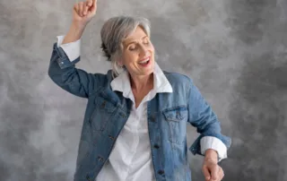 Older woman dancing and enjoying herself