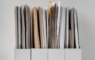 Files and folders of confidential information sitting unprotected on a shelf