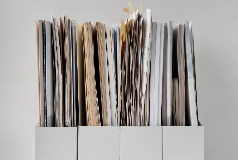 Files and folders of confidential information sitting unprotected on a shelf